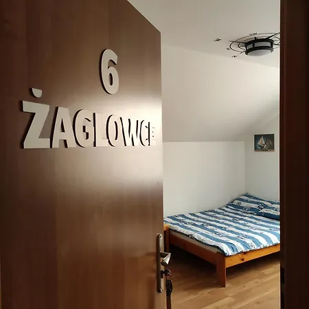 Sloneczny Dom 招待所 3*